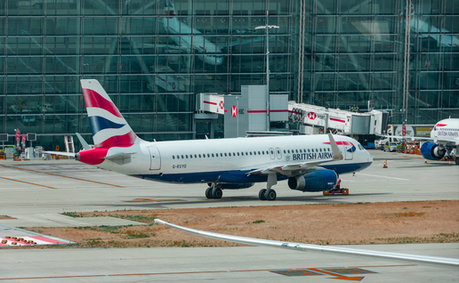 British Airways plane arriving at a terminal in Heathrow