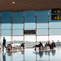 People waiting in the boarding gate in the El Prat airport in Barcelona