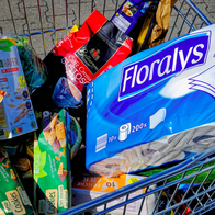 A shopping trolley full of a variety of products