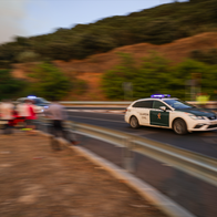 Police car rushing to an emergency with blurred surroundings