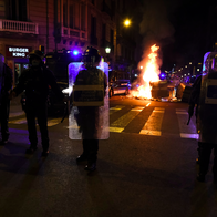 Protesters setting fire on rubbish containers during a riot in Barcelona