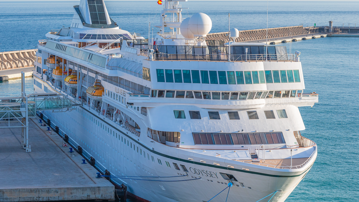 View of the cruise ship Villa Vie Odyssey, a Villa Vie Residences company ship stopover at the port of Malaga, Andalusia.