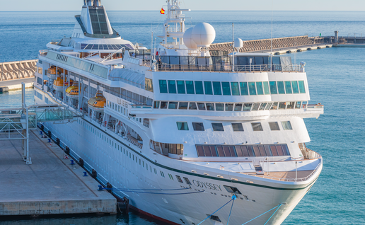 View of the cruise ship Villa Vie Odyssey, a Villa Vie Residences company ship stopover at the port of Malaga, Andalusia.