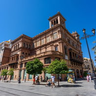 Historic building in central Seville, Spain, a popular destination for autumn getaways
