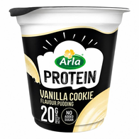 A black and white pot of Arla Protein vanilla cookie flavour pudding with a cream-coloured swirl design, marked 20g protein and no added sugar.