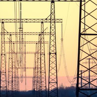 High-voltage power lines at sunset in Spain