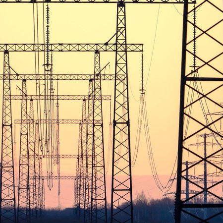 High-voltage power lines at sunset in Spain