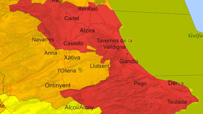 AEMET red weather warning map highlighting areas of Valencia and Alicante at risk of torrential rain.
