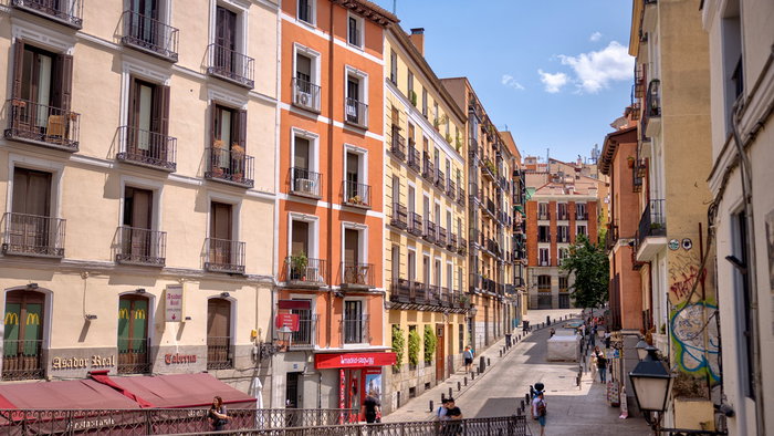 Residential apartment buildings in Madrid, Spain, amid new restrictions on seasonal rental listings.