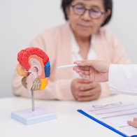 Elderly Patient consulting Doctor to Brain disease, Senior Health Medical Diagnosis.