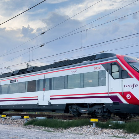 High speed Renfe train in motion on a train track