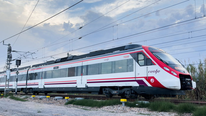 High speed Renfe train in motion on a train track
