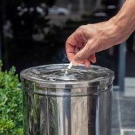 Hand,Holding,A,Cigarette,In,Hand,,Cigarette,Ashtray,,Stainless,Steel