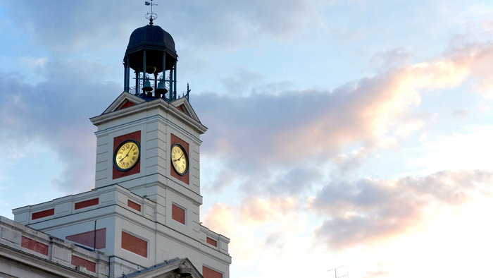 Clock tower in Madrid Spain during sunset