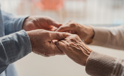 elderly hands holding
