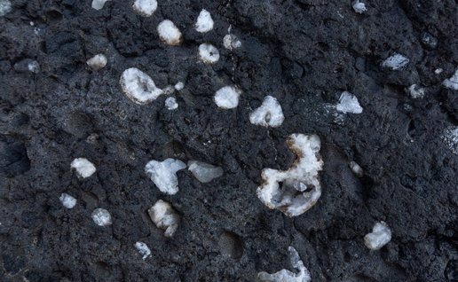 A,Close-up,Of,Dark,Vesicular,Volcanic,Rock,Matrix,Filled,With