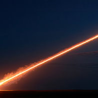 A,Powerful,Rocket,Ascends,Into,The,Dark,Night,Sky,Leaving