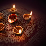 Happy Diwali - Diya lamps lit during diwali celebration