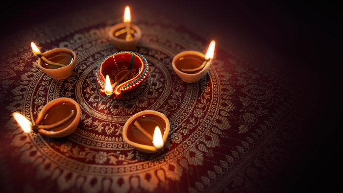 Happy Diwali - Diya lamps lit during diwali celebration