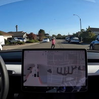 Full-self-drive Tesla braking for child in road.