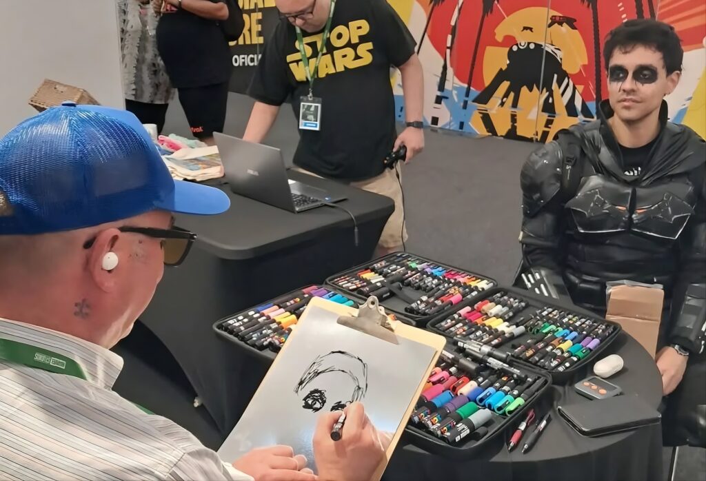 Cosplayers queue for free mind-portraits as Fuengirola artist packs Comic-Con Malaga floor